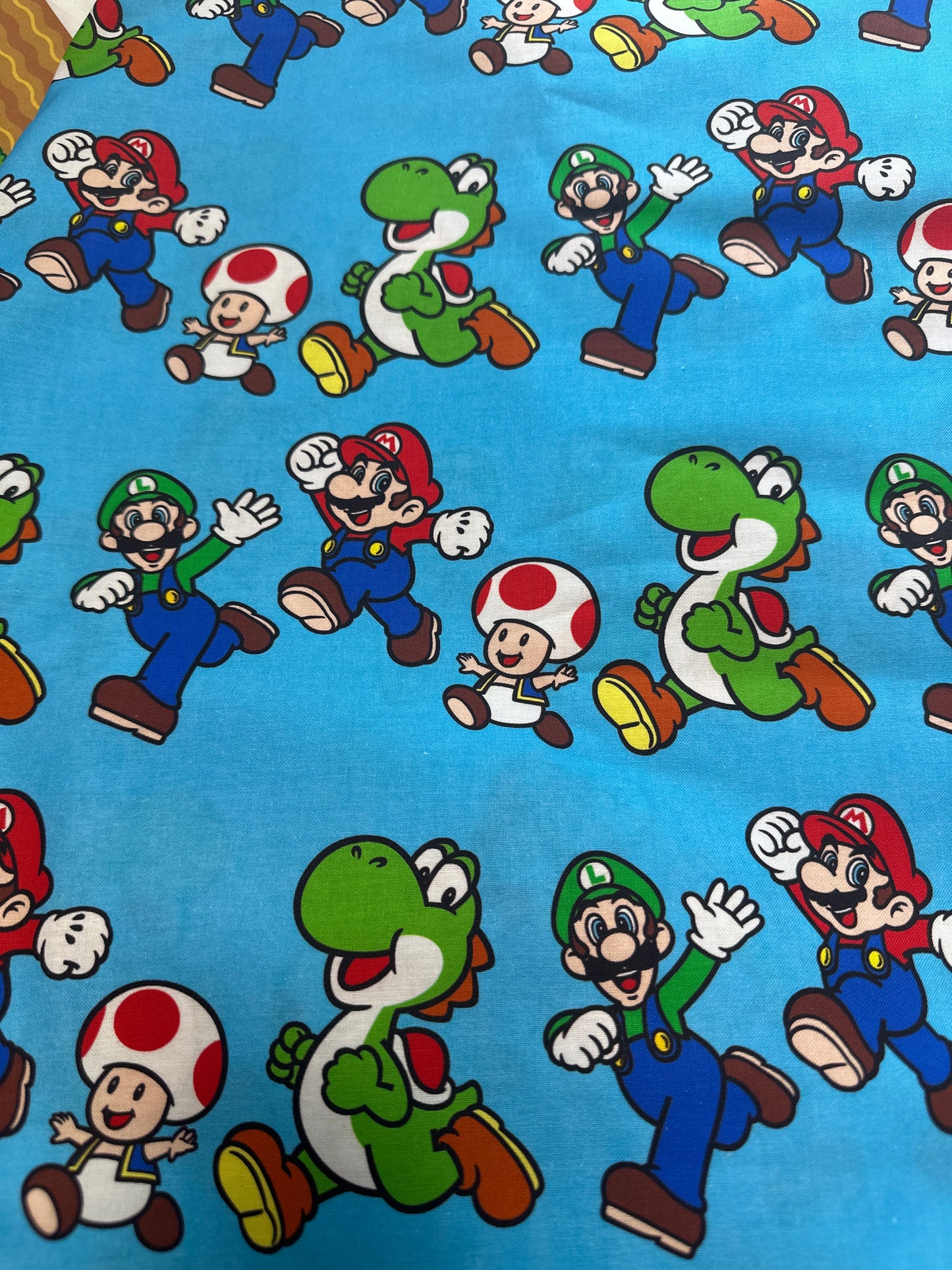 Springs Creative - Nintendo - Super Mario Friends- Jump - Priced per half metre