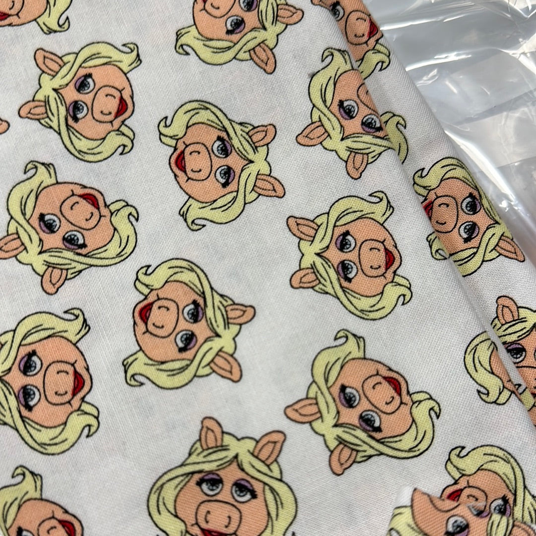 Last 24.5” x width of fabric - Camelot Fabrics - Disney’s The Muppets - Miss Piggy - White