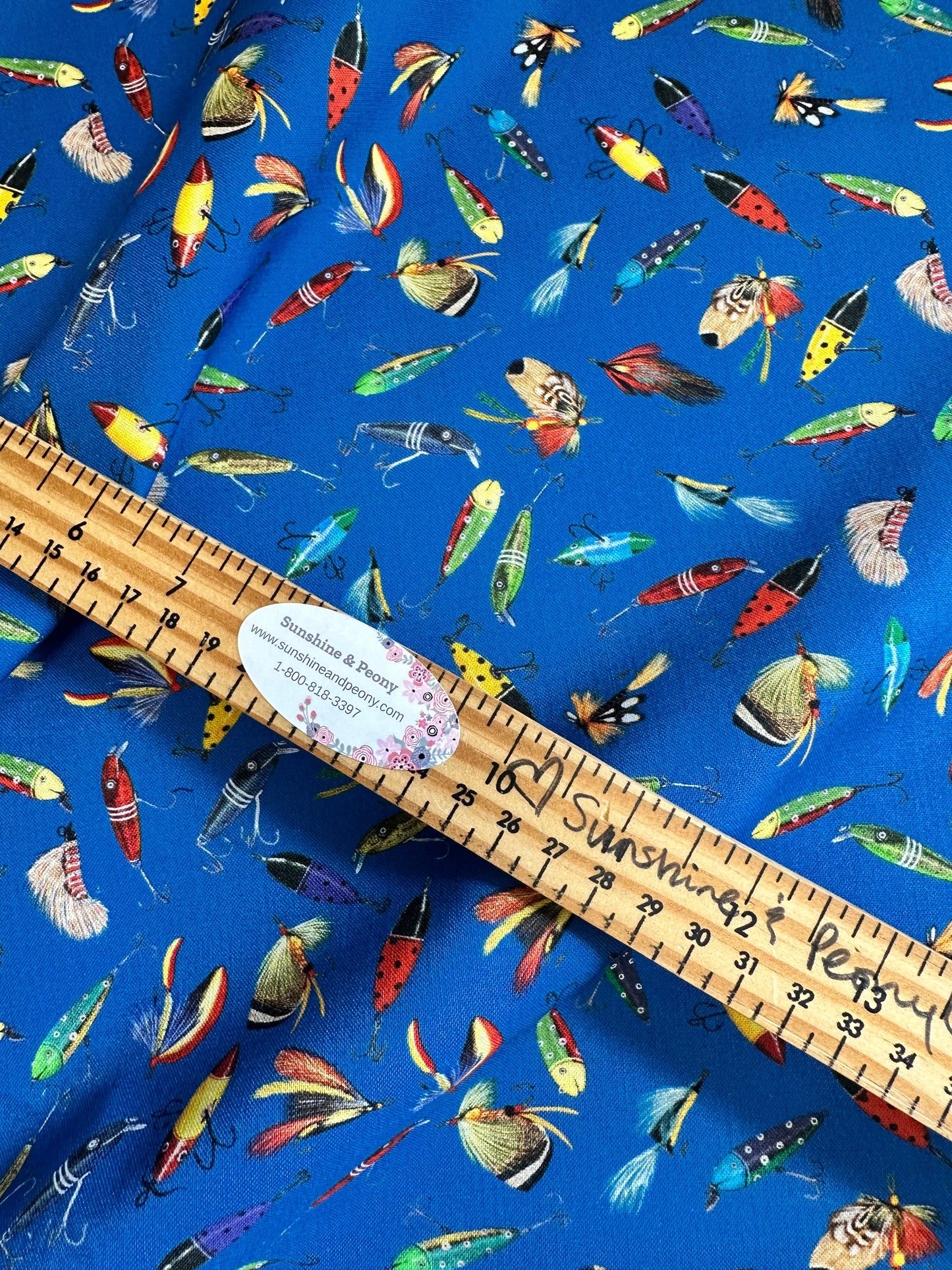 Robert Kaufman Fabrics - Lake House by Mary Lake Thompson for Robert Kaufman - Lagoon Fly Toss - Lures on Blue - Priced per half metre