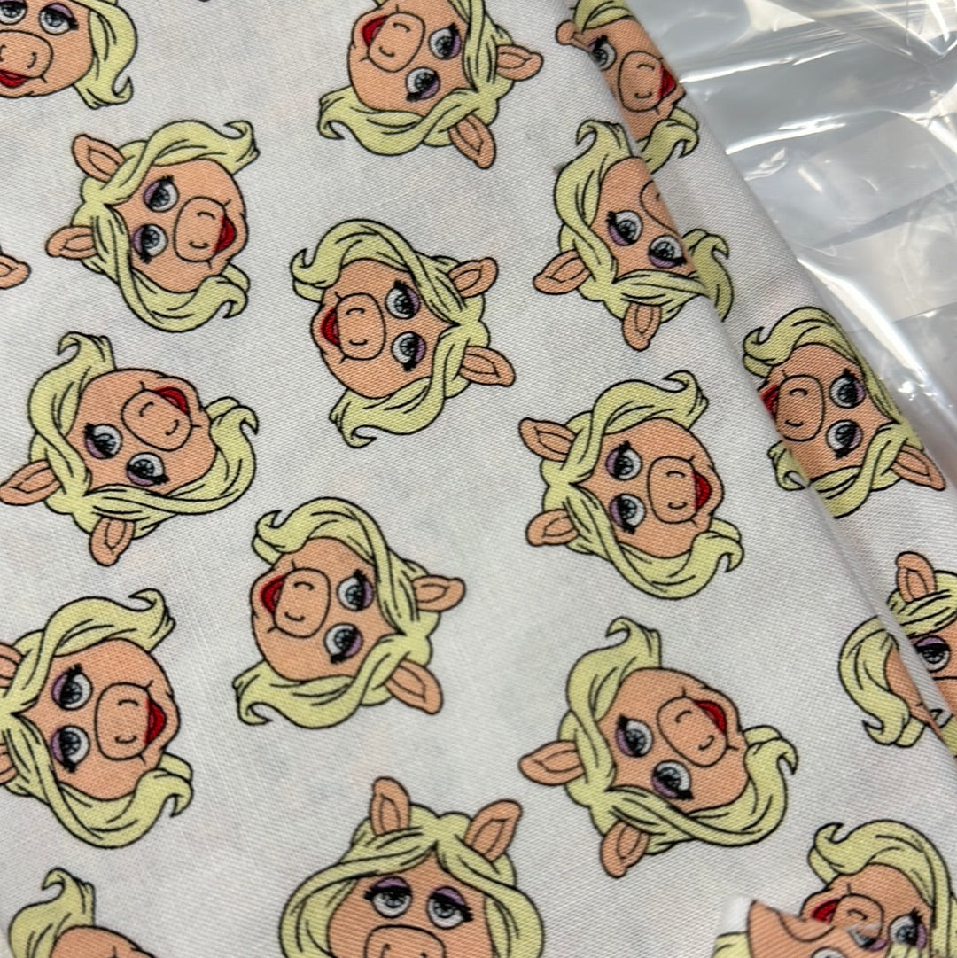 Last 24.5” x width of fabric - Camelot Fabrics - Disney’s The Muppets - Miss Piggy - White