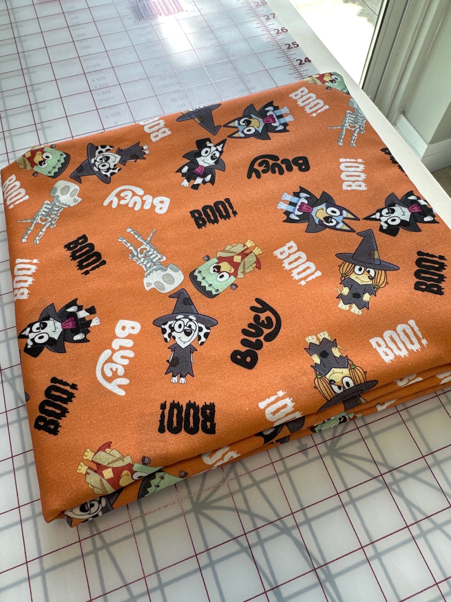 Halloween Bluey - Orange Boo Bluey - Priced by the half metre
