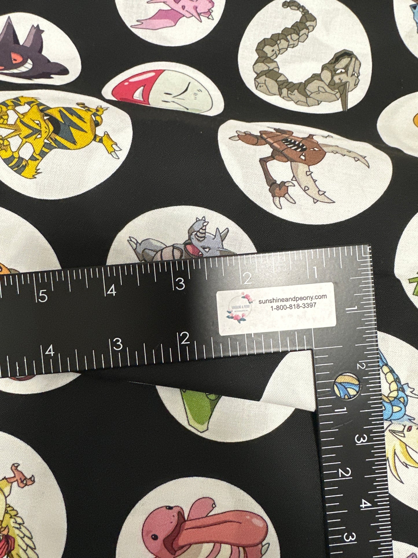 Pokémon in Circles - Black - Robert Kaufman Fabrics - Priced by the half metre