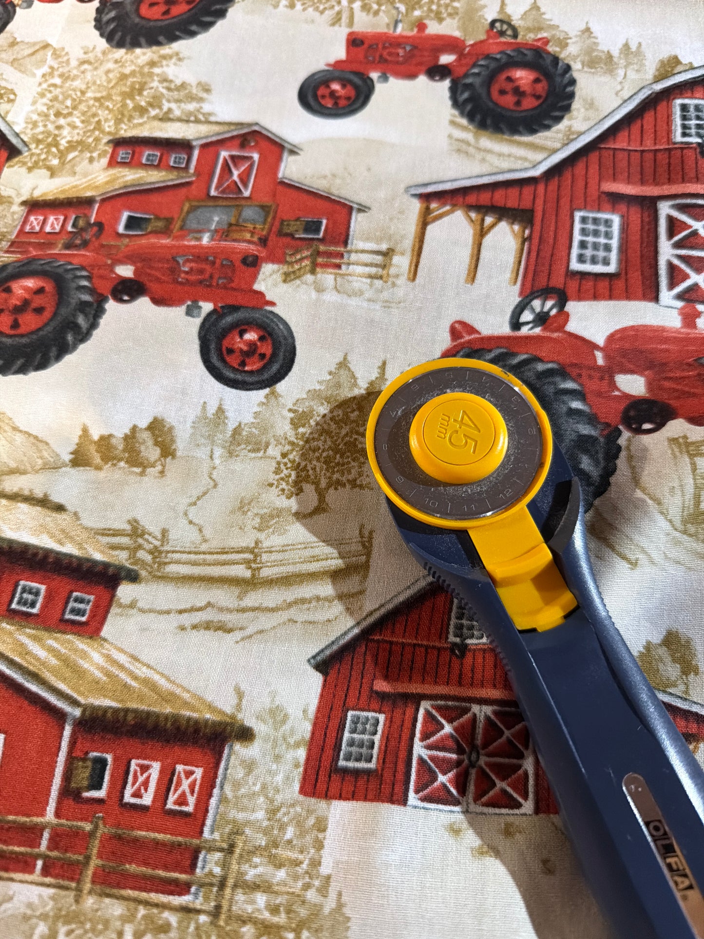 David Textiles - Farm Tractors - Red on cream - Priced per half Metre