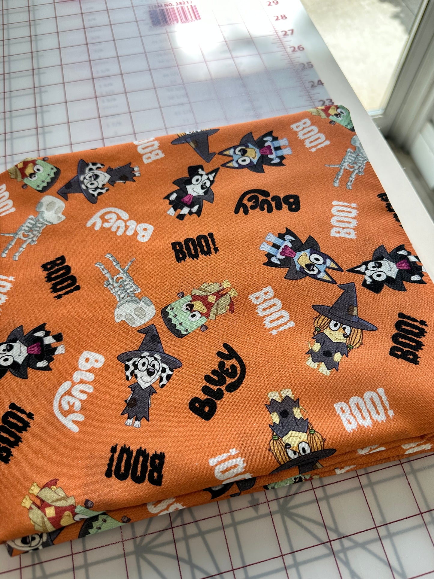Halloween Bluey - Orange Boo Bluey - Priced by the half metre