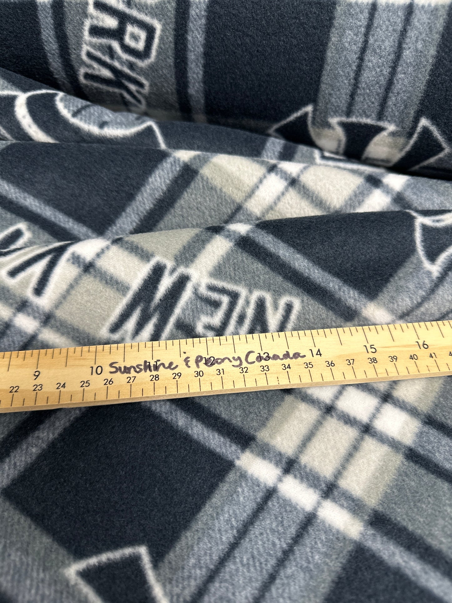 Last approx 35 “ x width of fabric - Fleece - New York Yankees - Blue and White Plaid