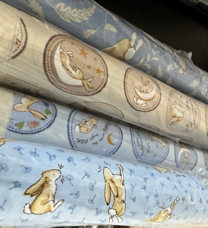 Clothworks - Guess How Much I Love You 2024 Collection -   Tossed Bunnies - Light Denim -  Priced by the half metre