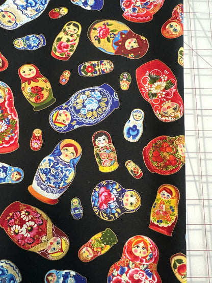 Matryoshka - Tossed Dolls Metallic Black from Elizabeth’s Studio Fabric