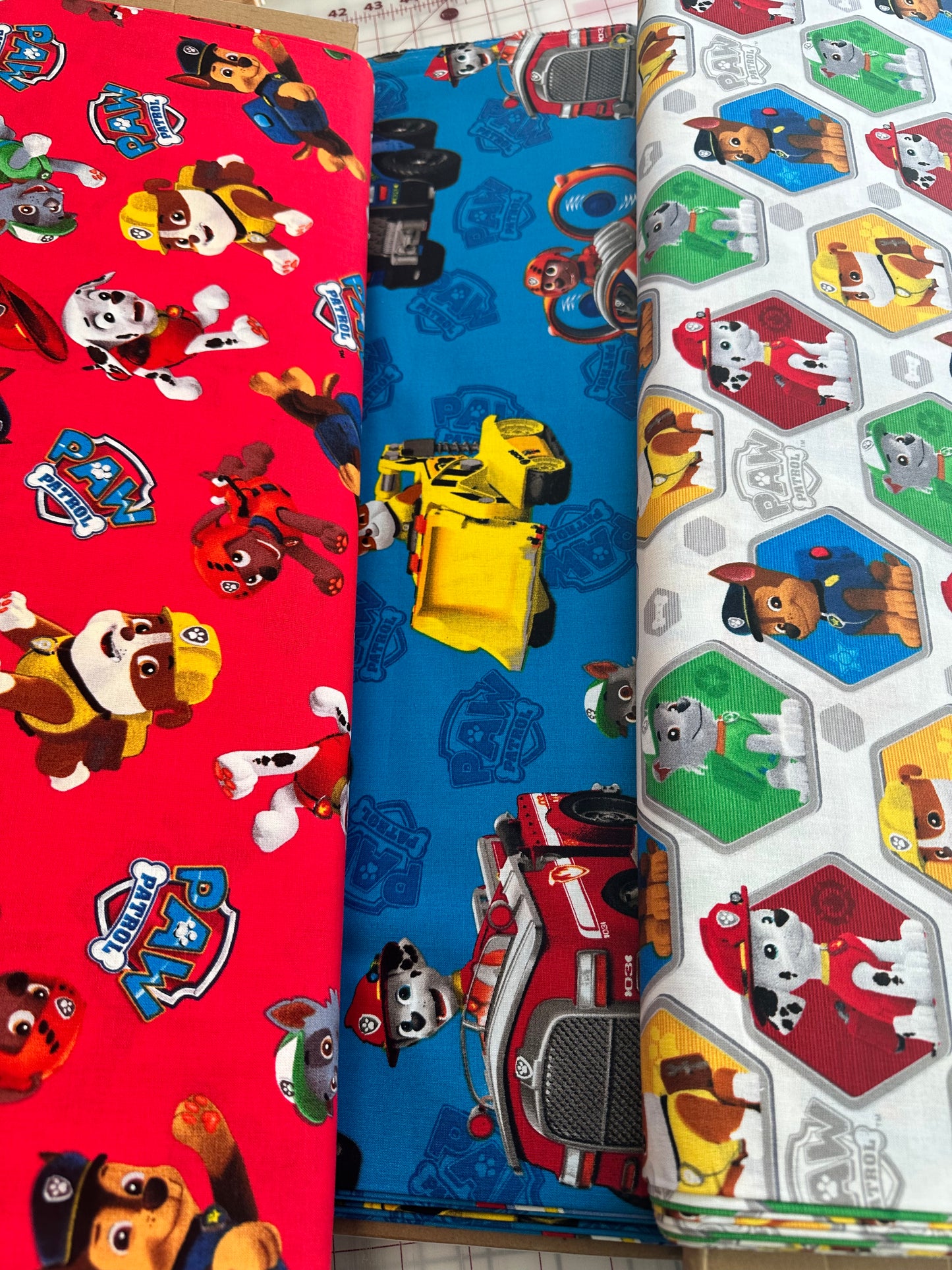 Paw Patrol by David Textiles - Paw Patrol Rescue Car - Blue - Priced per half metre