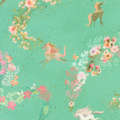 A fabric from the Unicorn Meadow collection featuring a seafoam color background with floral patterns and whimsical unicorn illustrations.