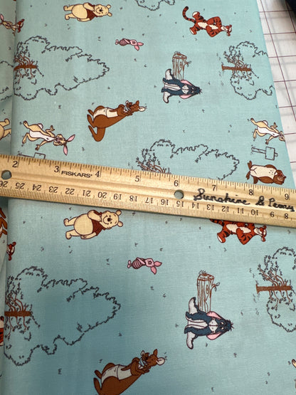 Disney - Springs Creative - Winnie the Pooh - Classic Characters on Light Green - Priced by the Half Metre