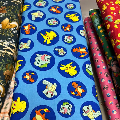 Pokémon in Circles - Blue - Robert Kaufman Fabrics